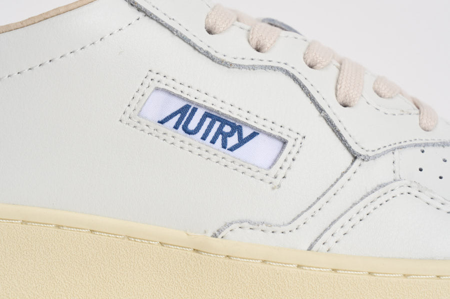 Sneakers uomo Medalist Low bianca e verde AULM BJ02 AUTRY 