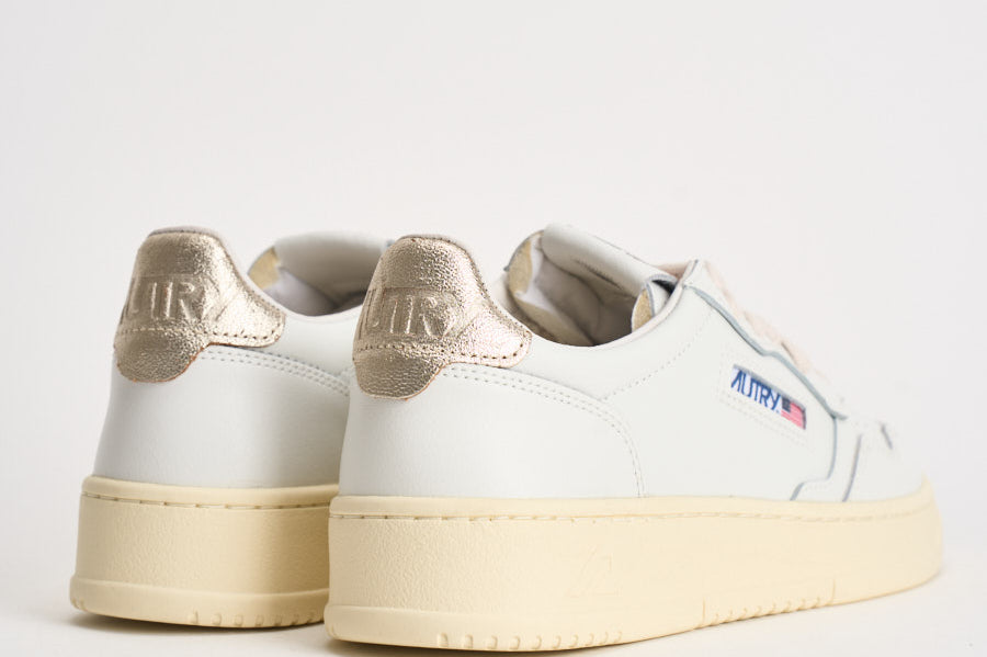 Sneakers donna Medalist Low bianca e oro AULW LL06 AUTRY 