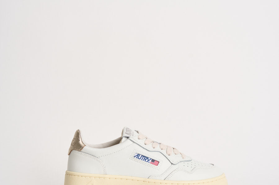Sneakers donna Medalist Low bianca e oro AULW LL06 AUTRY 