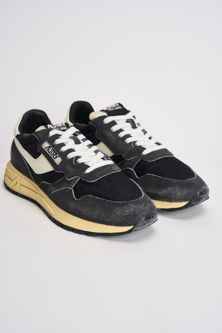 Sneakers uomo Reelwind bianca e grigia WWLM GQ07 AUTRY 