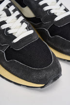 Sneakers uomo Reelwind bianca e grigia WWLM GQ07 AUTRY 