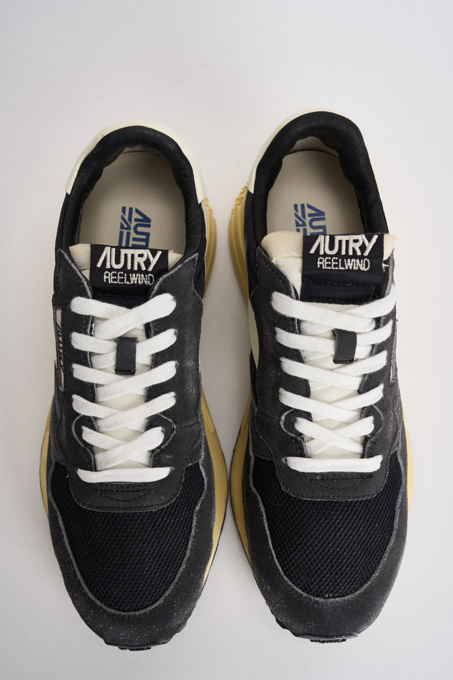 Sneakers uomo Reelwind bianca e grigia WWLM GQ07 AUTRY 