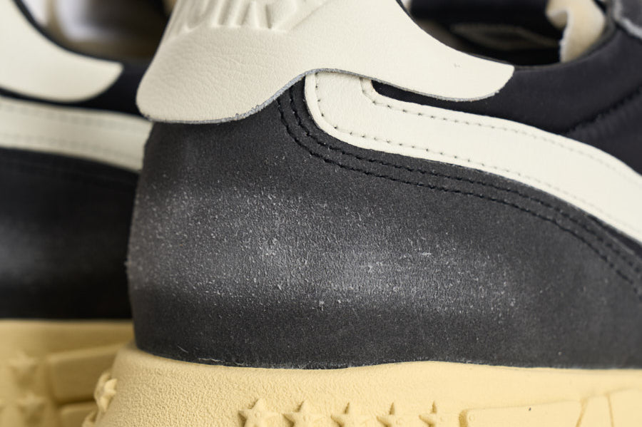 Sneakers uomo Reelwind bianca e grigia WWLM GQ07 AUTRY 