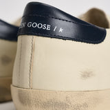 Sneakers uomo Super-star panna e blu navy GMF00101 F00416415430 GOLDEN GOOSE 