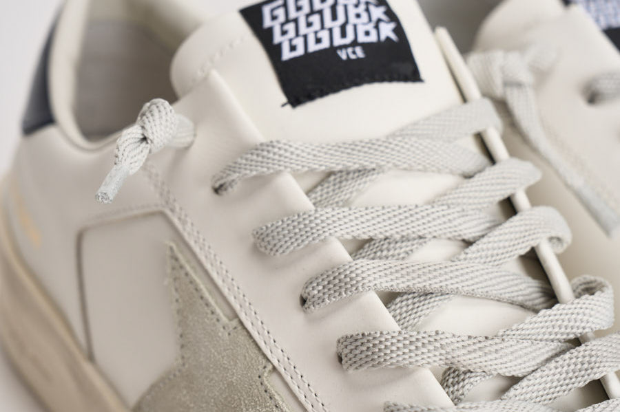 Sneakers uomo Stardan bianche e nere GMF00128 F00056710509 GOLDEN GOOSE 