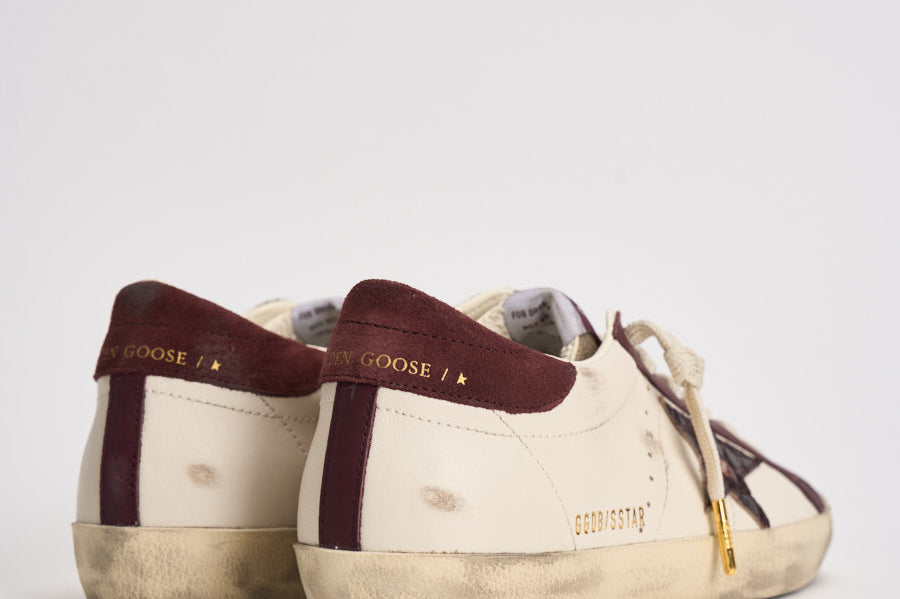 Sneakers donna Super Star bianca e bordeaux GWF01002 F00876115993 GOLDEN GOOSE 
