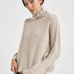 Maglia donna Tila collo alto beige chiaro TILA AVOINE KUJTEN 