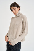 Maglia donna Tila collo alto beige chiaro TILA AVOINE KUJTEN 