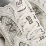 Sneakers donna 530 bianche e tortora U530 CSB NEW BALANCE 
