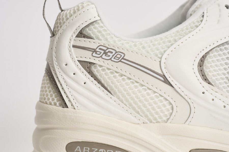 Sneakers uomo 530 bianche e tortora U530. CSB NEW BALANCE 