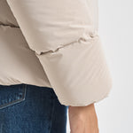 Piumino donna con cappuccio over bianco ghiaccio W26544 85 RRD 