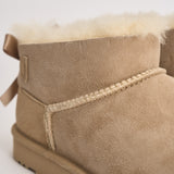 Stivaletti donna Ultra Mini Bailey Bow sabbia 1185491 SAND UGG 