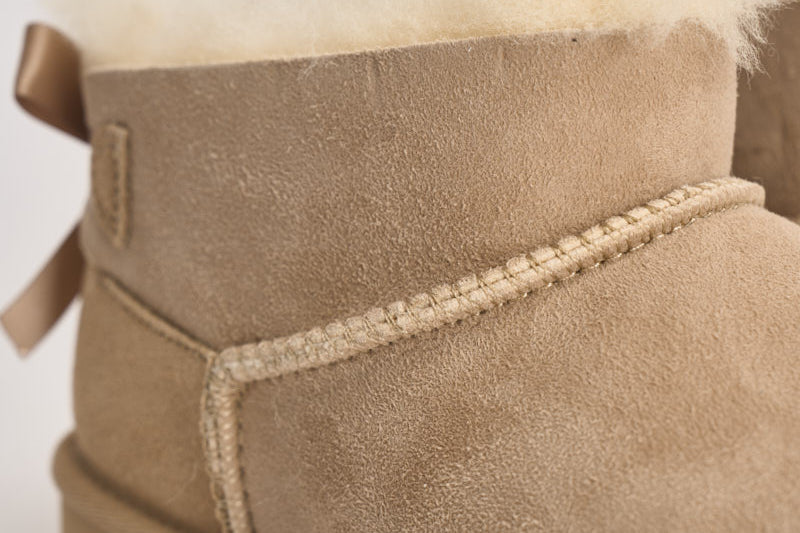 Stivaletti donna Ultra Mini Bailey Bow sabbia 1185491 SAND UGG 