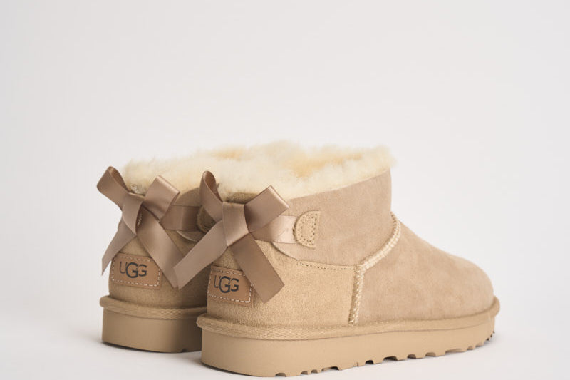 Stivaletti donna Ultra Mini Bailey Bow sabbia 1185491 SAND UGG 
