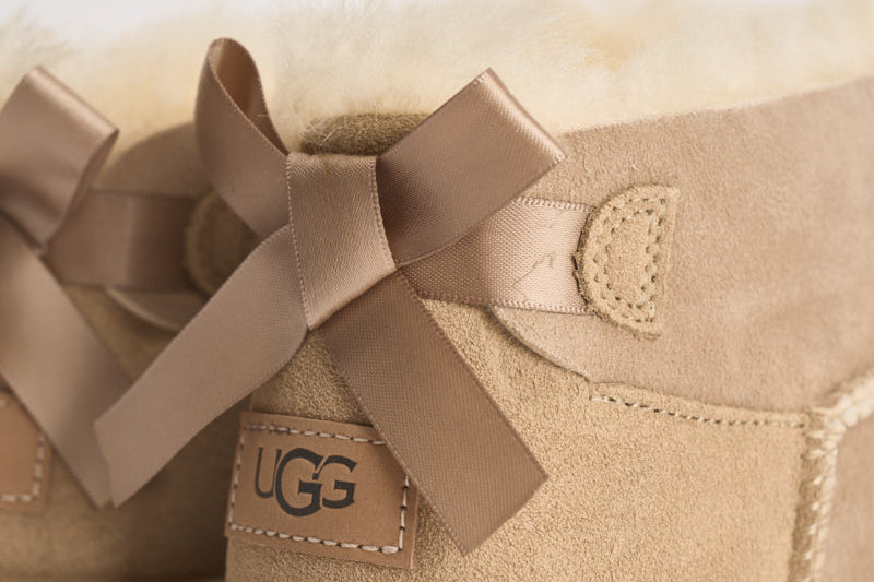Stivaletti donna Ultra Mini Bailey Bow sabbia 1185491 SAND UGG 