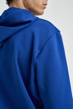 Felpa uomo con cappuccio blu AXT174 NAVY COMME DES GARCON PLAY 
