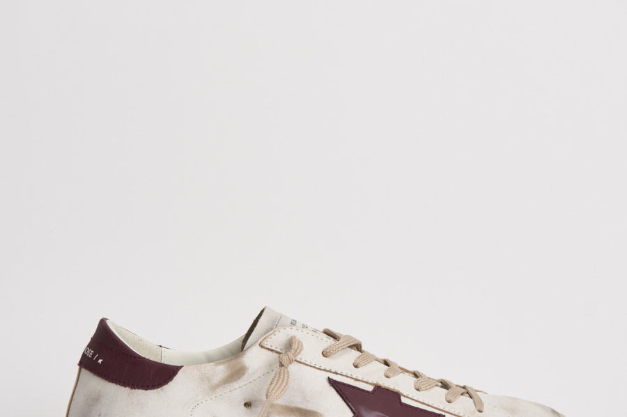 Sneakers uomo Super-star bianca e bordeaux GMF00101 F00811410350 GOLDEN GOOSE 