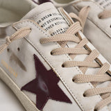Sneakers uomo Super-star bianca e bordeaux GMF00101 F00811410350 GOLDEN GOOSE 
