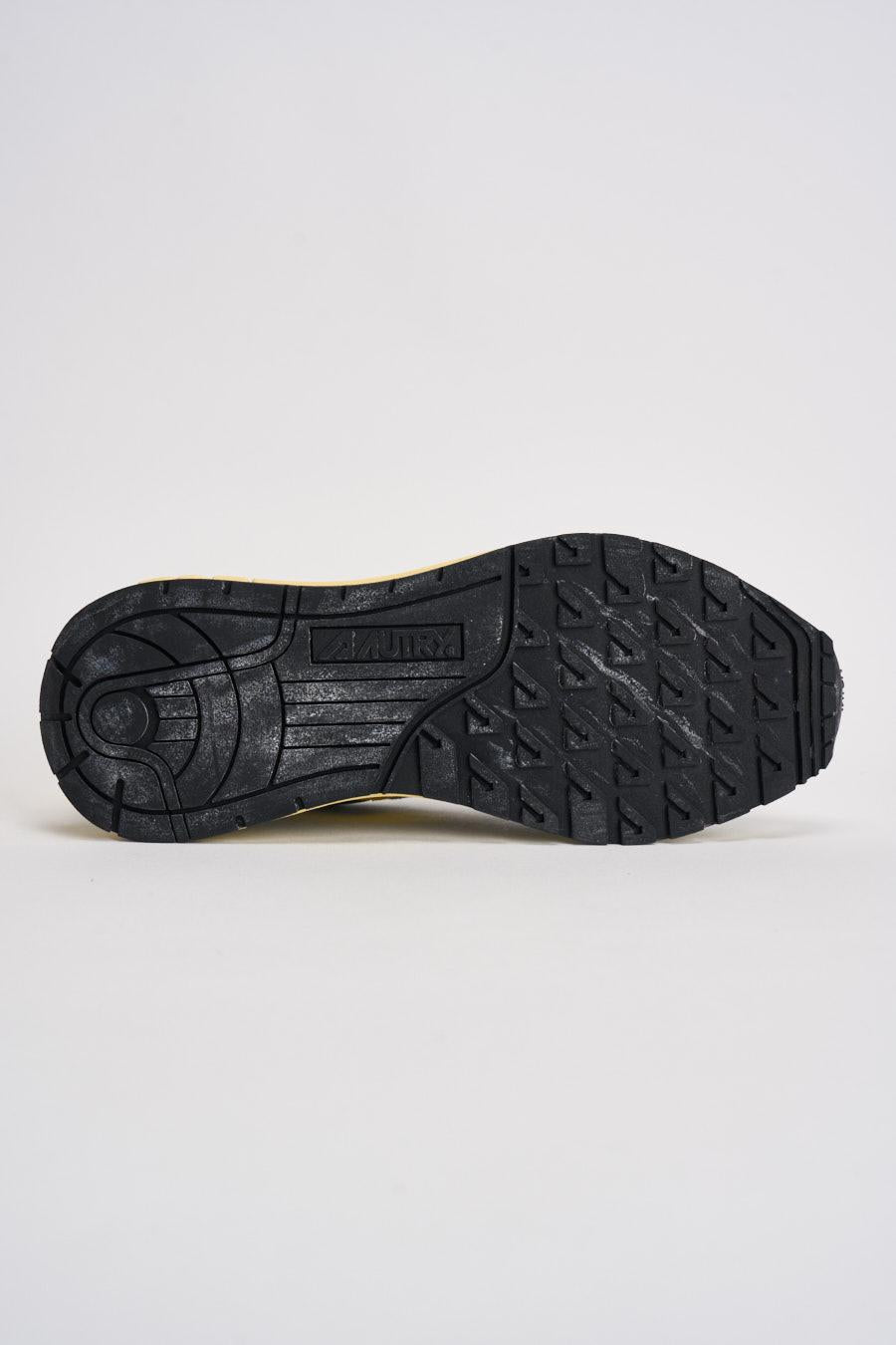 Sneakers uomo Reelwind grigia e gialla WWLM GQ06 AUTRY 