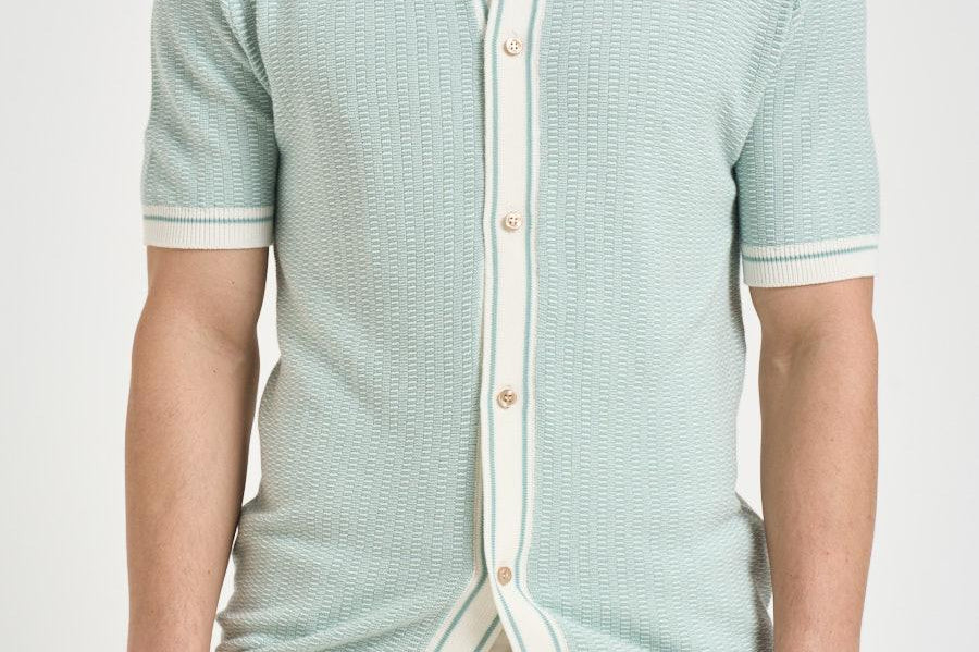 Polo in maglia celeste SHELTER PWE26053ZX TAGLIATORE 