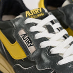 Sneakers uomo Reelwind grigia e gialla WWLM GQ06 AUTRY 