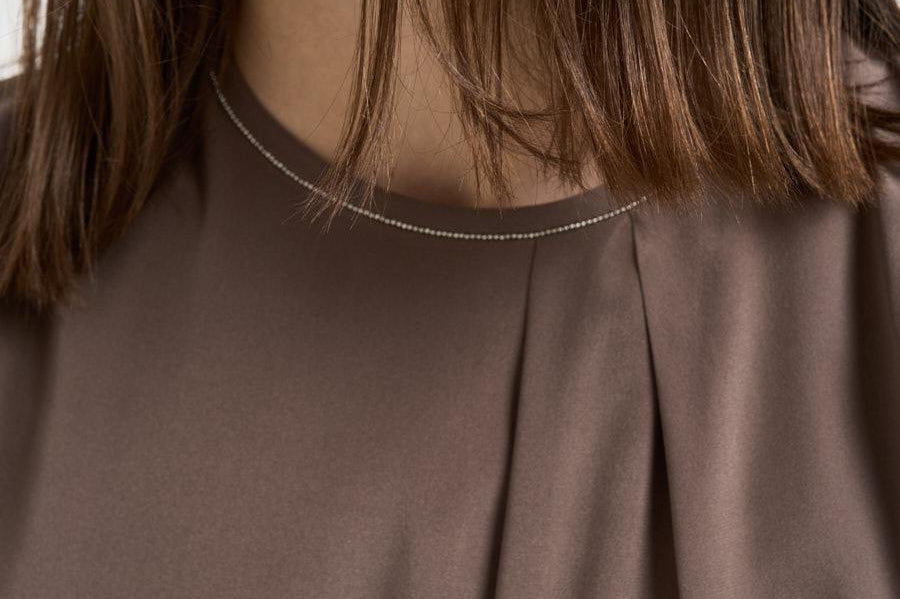 Top donna smanicato plissettato marrone A08634 07325151 PESERICO 