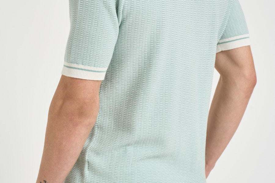 Polo in maglia celeste SHELTER PWE26053ZX TAGLIATORE 
