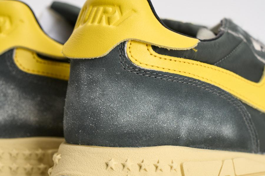 Sneakers uomo Reelwind grigia e gialla WWLM GQ06 AUTRY 