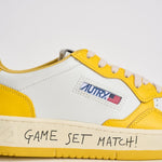 Sneakers uomo Medalist Low bianca e gialla AULM BH01 AUTRY 