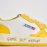 Sneakers uomo Medalist Low bianca e gialla AULM BH01 AUTRY 