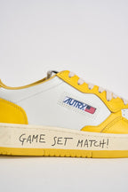 Sneakers uomo Medalist Low bianca e gialla AULM BH01 AUTRY 