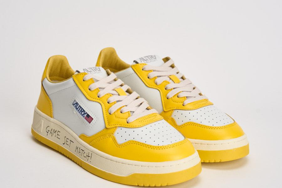Sneakers uomo Medalist Low bianca e gialla AULM BH01 AUTRY 