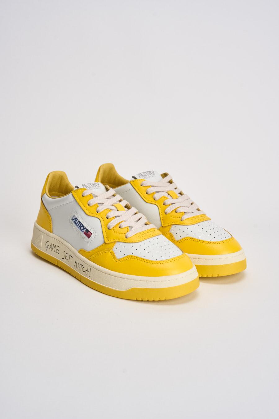 Sneakers uomo Medalist Low bianca e gialla AULM BH01 AUTRY 