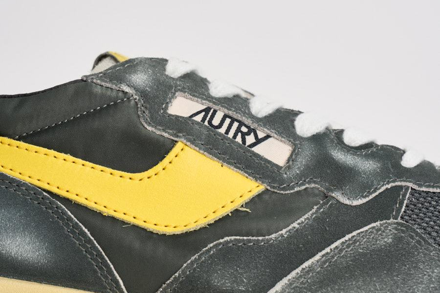 Sneakers uomo Reelwind grigia e gialla WWLM GQ06 AUTRY 