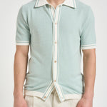 Polo in maglia celeste SHELTER PWE26053ZX TAGLIATORE 