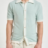 Polo in maglia celeste SHELTER PWE26053ZX TAGLIATORE 
