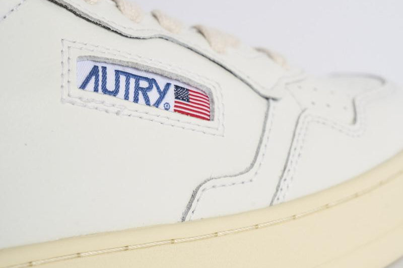Sneakers uomo in pelle bianca con spoiler AULM LL12 AUTRY 
