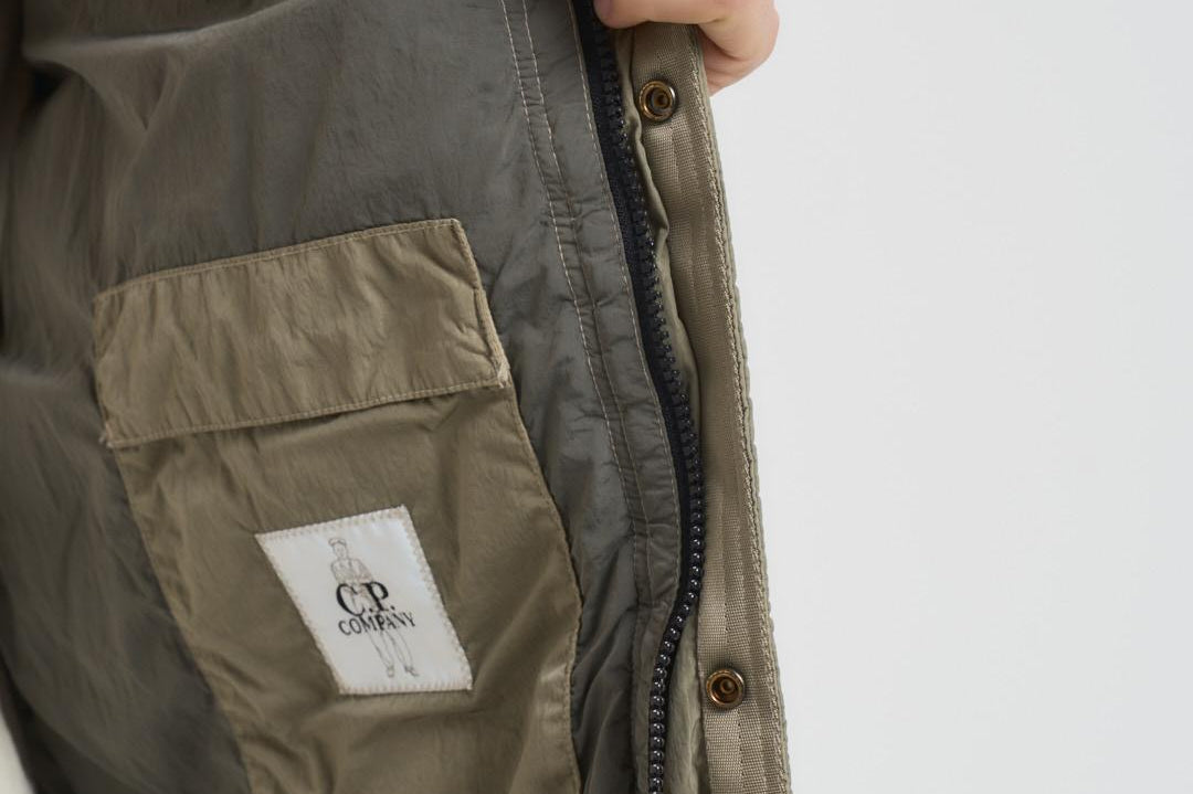 Piumino uomo trapuntato grigio pietra 19CMOW012A 005904G356 C.P. COMPANY 