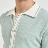 Polo in maglia celeste SHELTER PWE26053ZX TAGLIATORE 