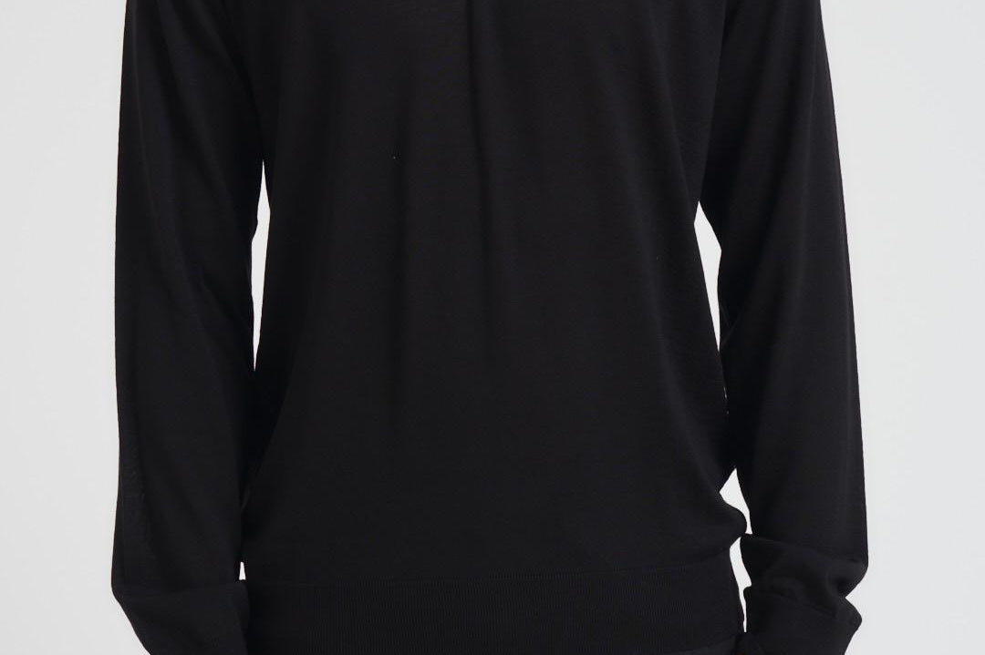 Polo uomo in lana merino nera GMP01353 P00104190100 GOLDEN GOOSE 