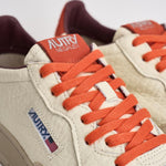 Sneakers uomo Medalist Low bianca e arancione AULM NE17 AUTRY 