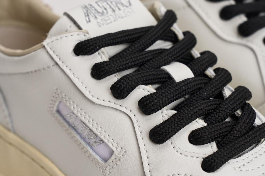 Sneakers donna Medalist Low bianca e cavallino leopardato AULW OC01 AUTRY 