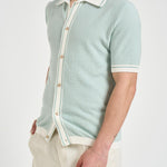 Polo in maglia celeste SHELTER PWE26053ZX TAGLIATORE 