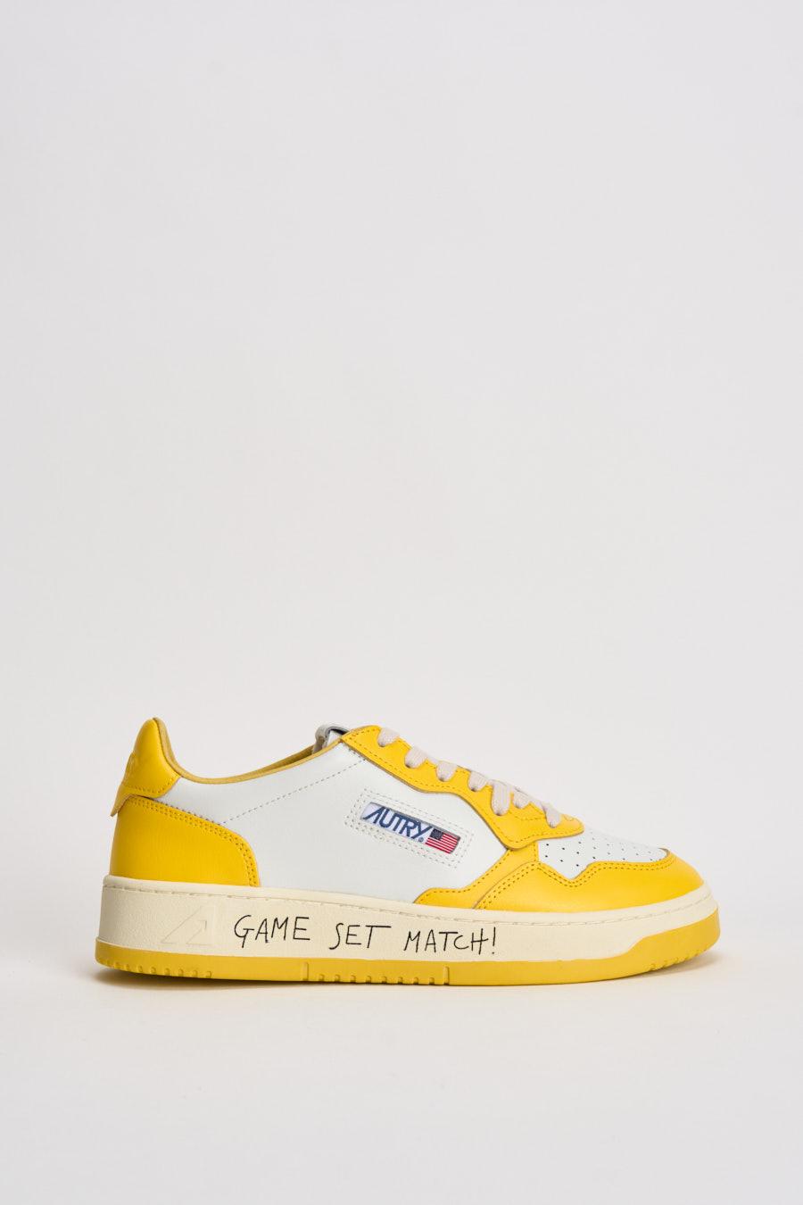 Sneakers uomo Medalist Low bianca e gialla AULM BH01 AUTRY 
